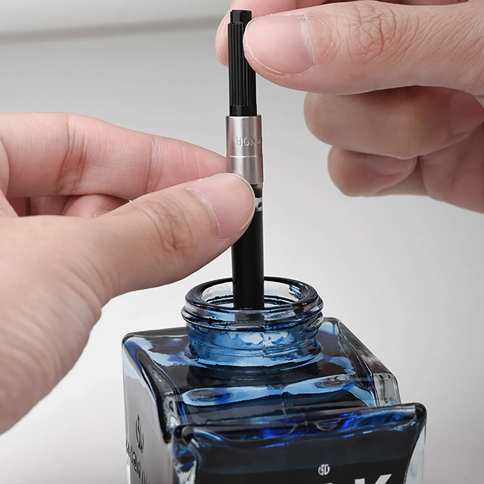 2pcs Rotary ink Absorber Fille - مراجعة Fountain Pen Bottled Ink وسعره
